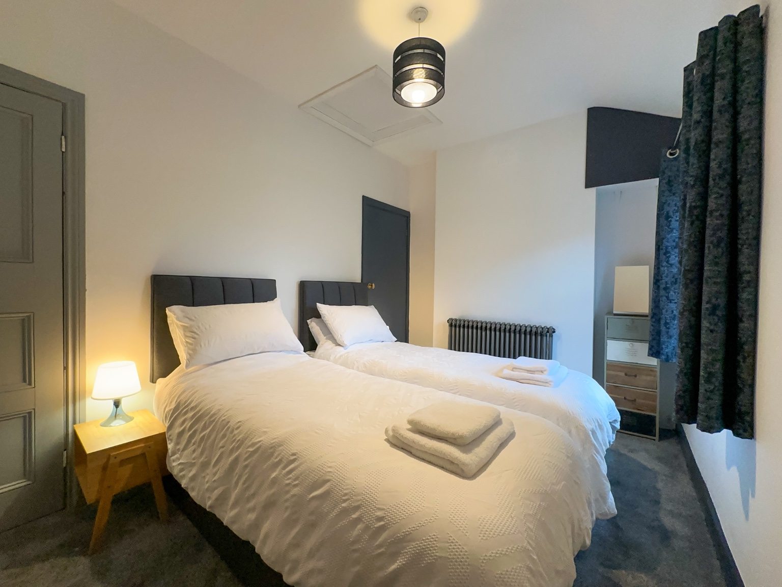 Second bedroom made up with twin beds